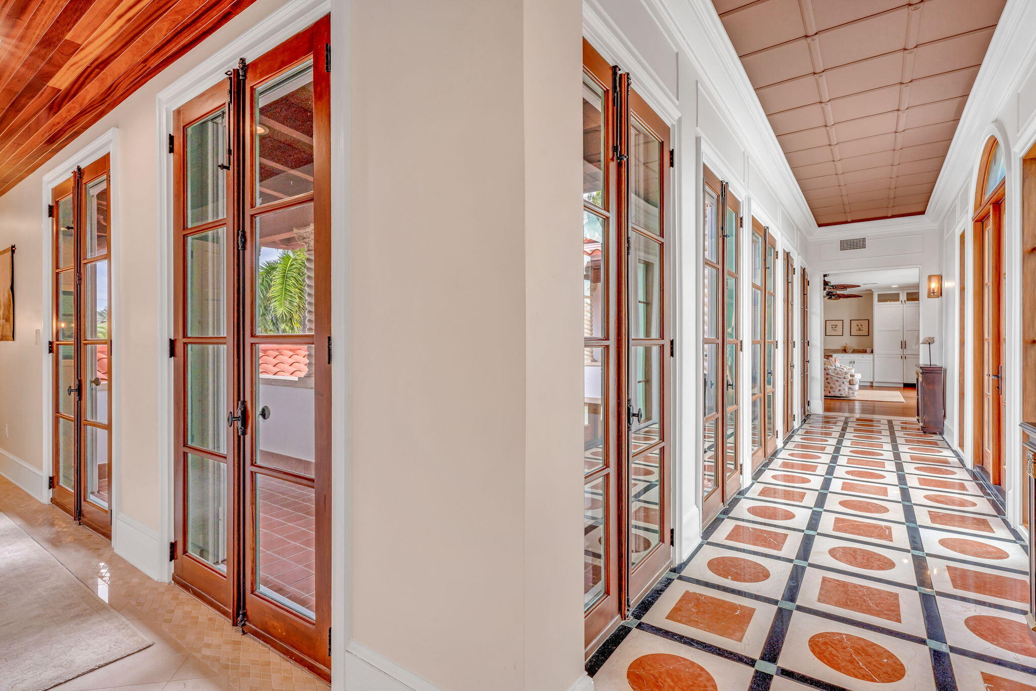 205 15th Circle Key Colony Beach, FL 33051 - Photo 51 of 101 a view of a hallway with wooden floor and windows