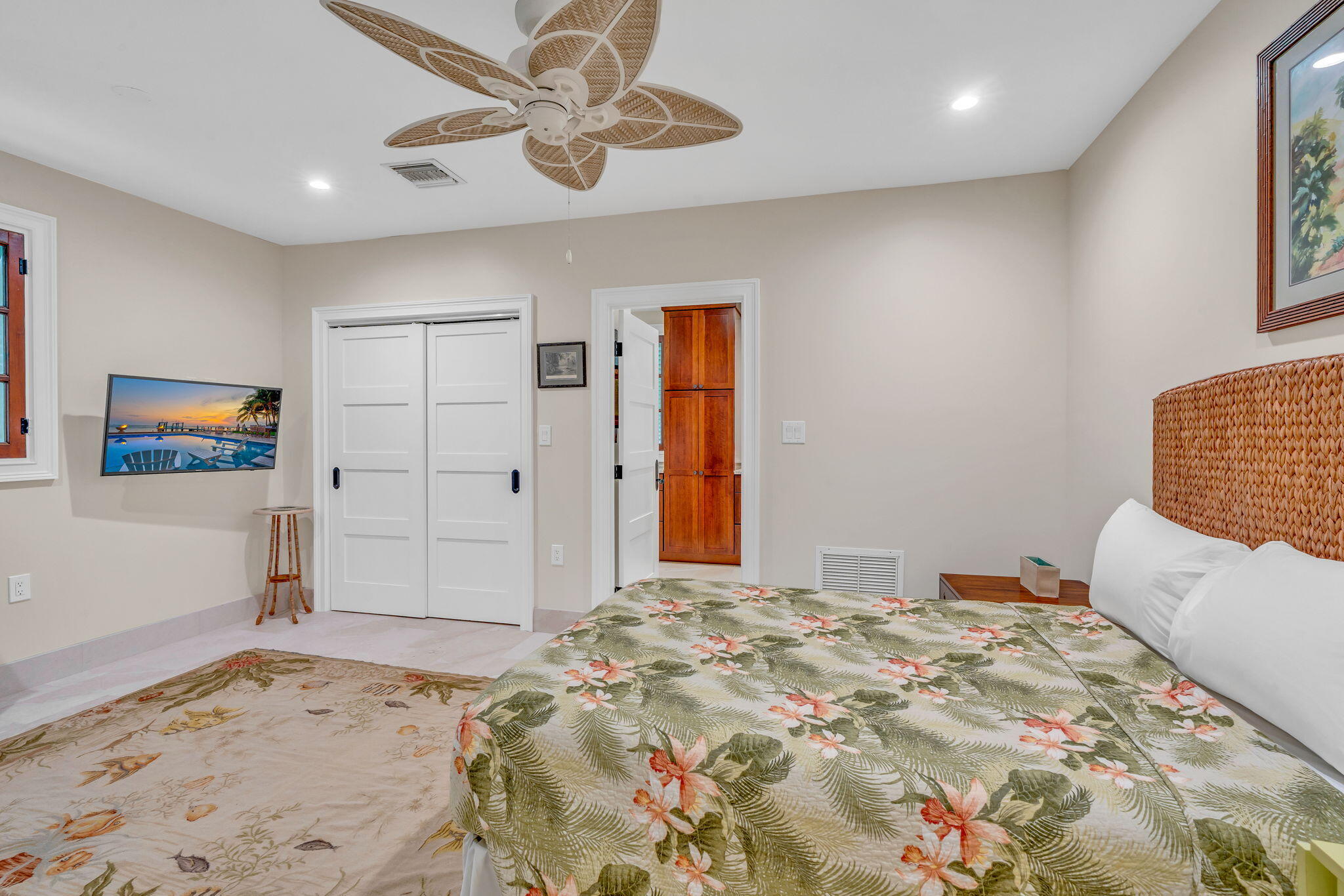 205 15th Circle Key Colony Beach, FL 33051 - Photo 57 of 101 a bedroom with a large bed and a window