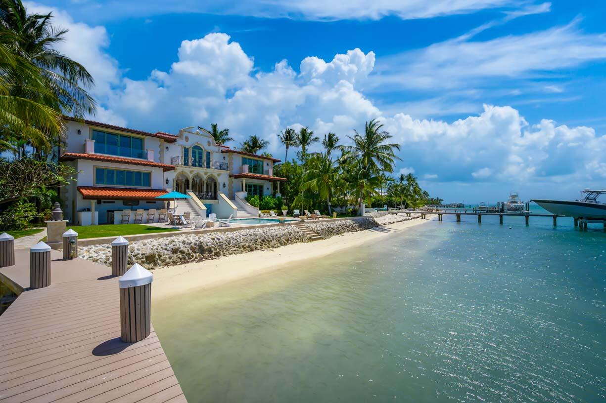 205 15th Circle Key Colony Beach, FL 33051 - Photo 80 of 101 a front view of a house with garden and street view