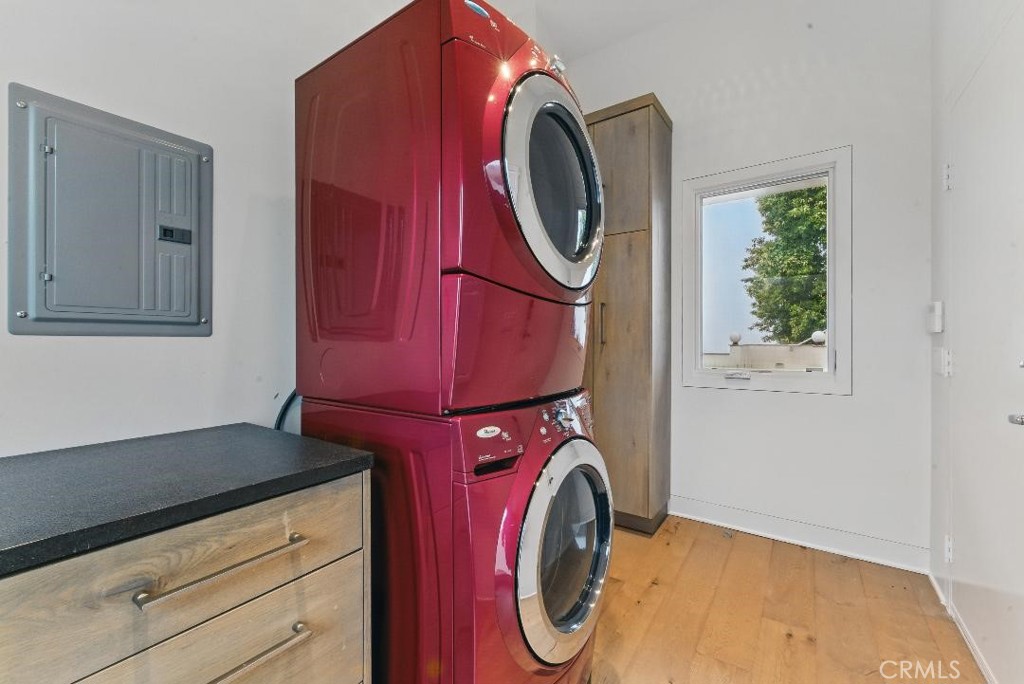 2501 Barrymore Drive Malibu, CA 90265 - Photo 29 of 54 a utility room with dryer and washer