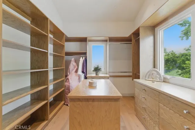 a living room with furniture rug and window