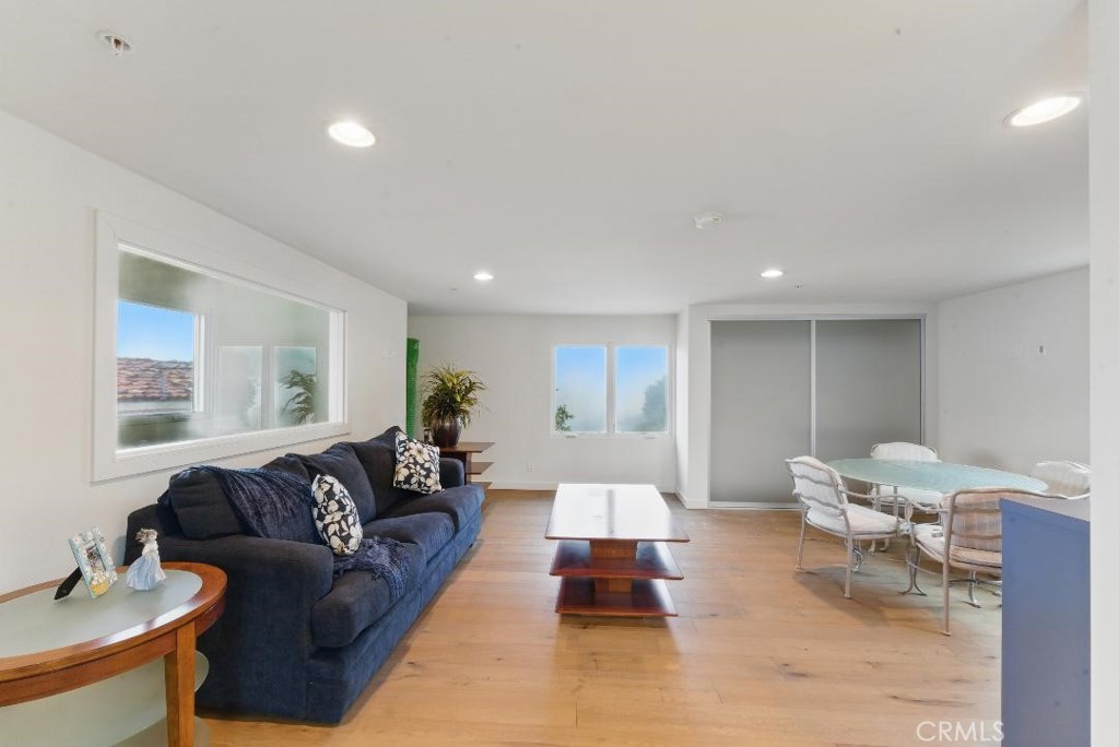 2501 Barrymore Drive Malibu, CA 90265 - Photo 43 of 54 a living room with furniture rug and window