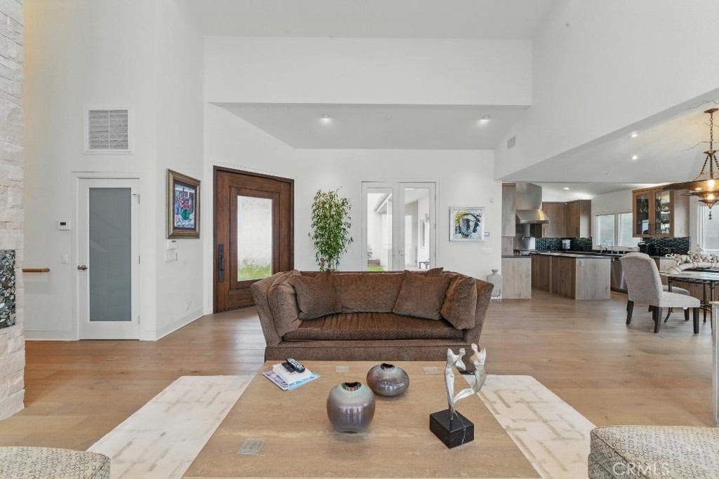 2501 Barrymore Drive Malibu, CA 90265 - Photo 5 of 54 a living room with furniture and kitchen view