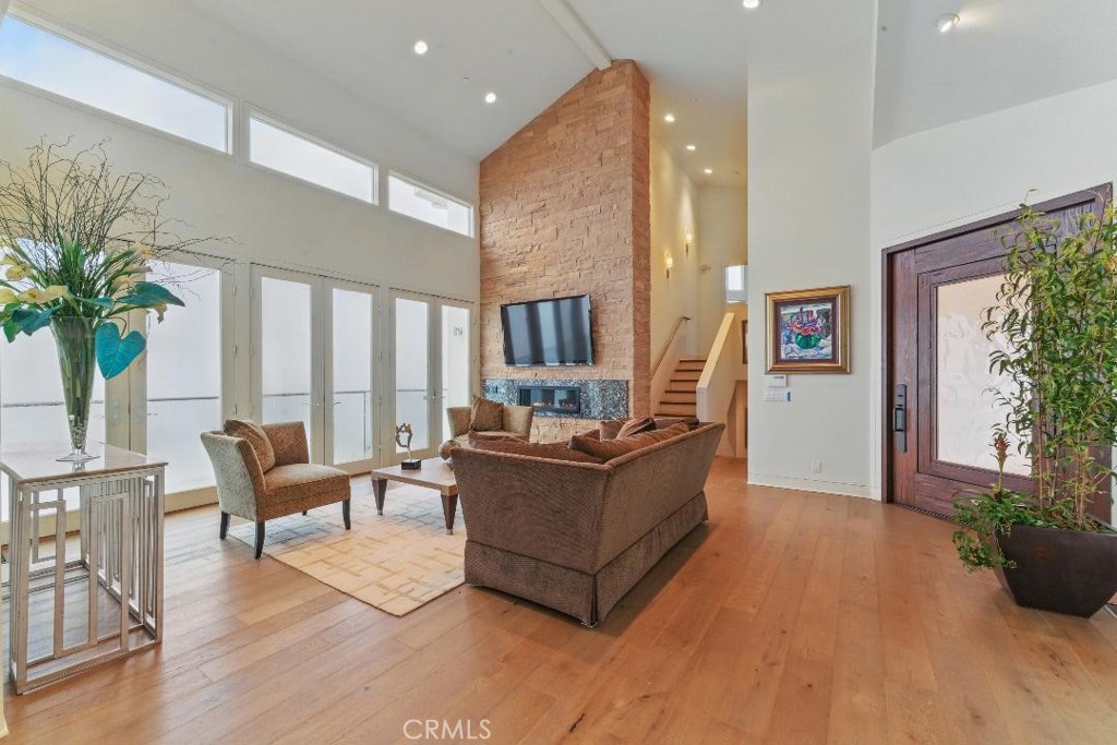 2501 Barrymore Drive Malibu, CA 90265 - Photo 7 of 54 a living room with furniture and a large window