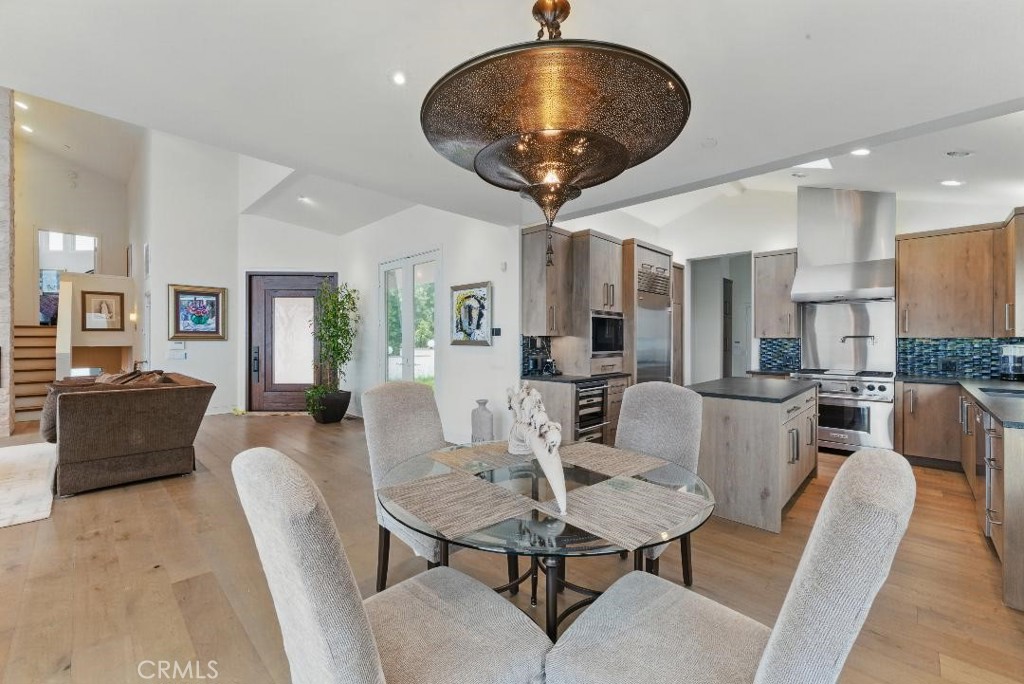 2501 Barrymore Drive Malibu, CA 90265 - Photo 9 of 54 a view of a dining room with furniture
