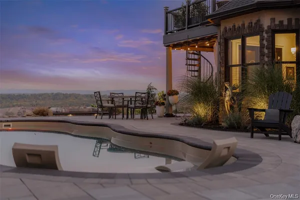 a view of roof with sitting area