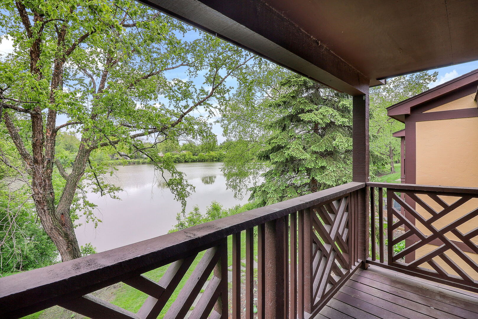 1782 Gloucester Court, Unit B Wheaton, IL 60189 - Photo 13 of 16 a view of a balcony with wooden floor and outdoor space