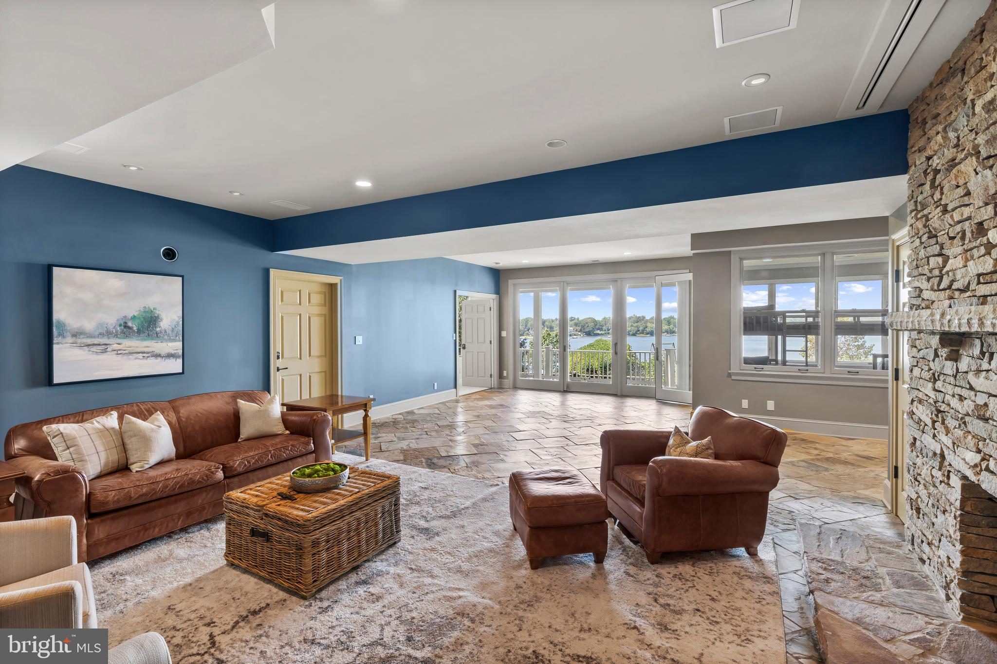 1900 Carrollton Road Annapolis, MD 21409 - Photo 42 of 50 Great room with fireplace and deck access