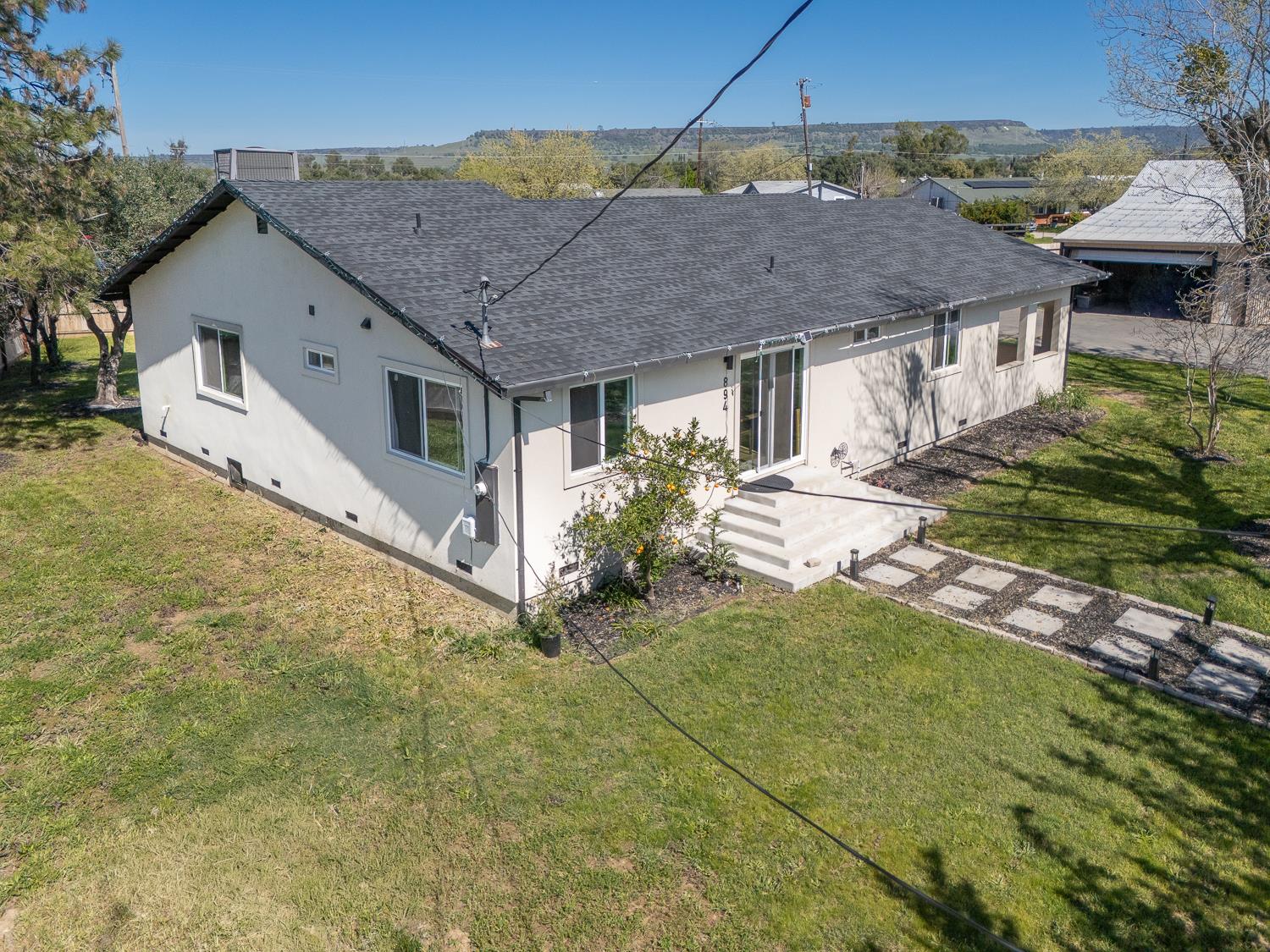 894 Grand Oroville, CA 95965 - Photo 1 of 49 a aerial view of a house with a yard