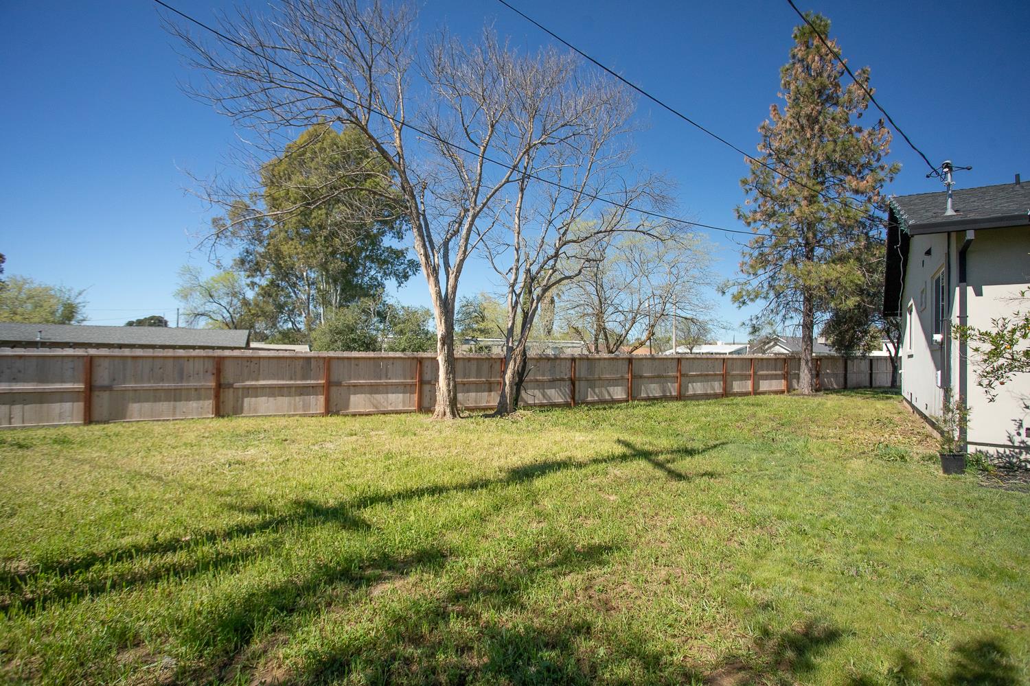 894 Grand Oroville, CA 95965 - Photo 31 of 49 a house with trees in front of it