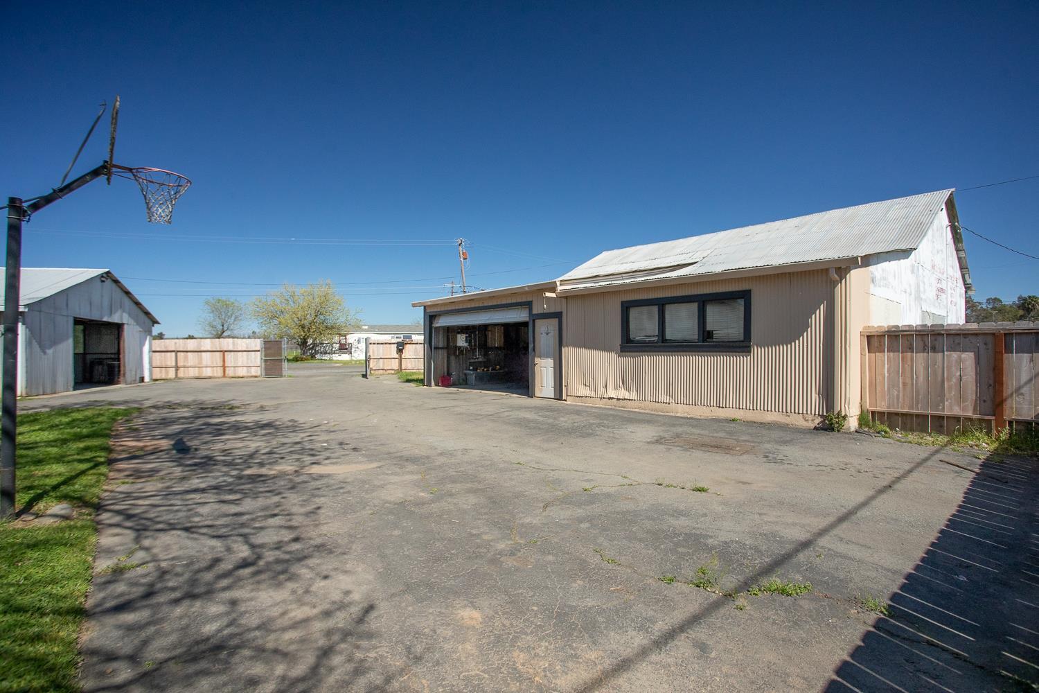 894 Grand Oroville, CA 95965 - Photo 32 of 49 a front view of a house with a yard and garage