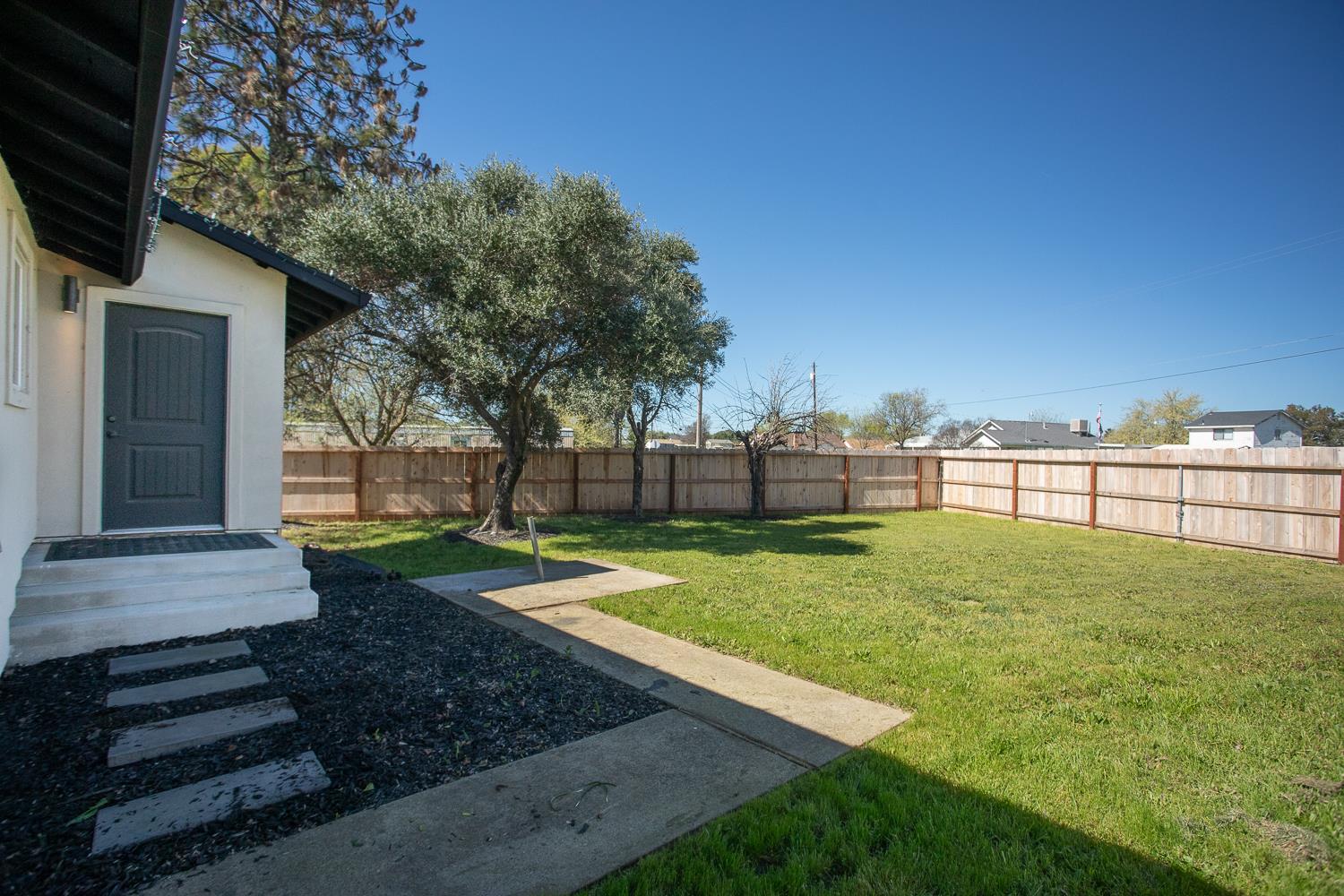 894 Grand Oroville, CA 95965 - Photo 33 of 49 a view of a backyard with garden