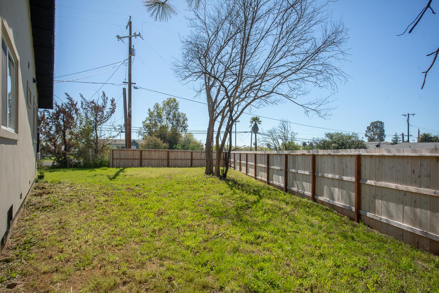 894 Grand Oroville, CA 95965 - Photo 35 of 49 a view of a yard with wooden fence
