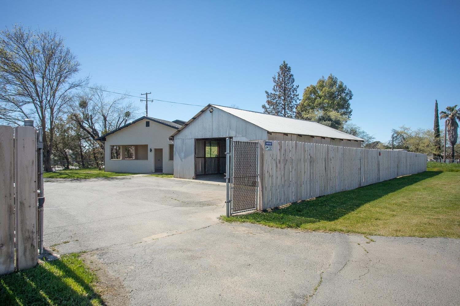 894 Grand Oroville, CA 95965 - Photo 41 of 49 a front view of a house with a yard and garage