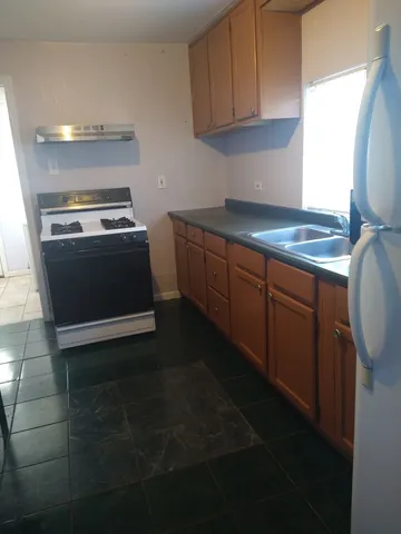 a utility room with window washer and dryer