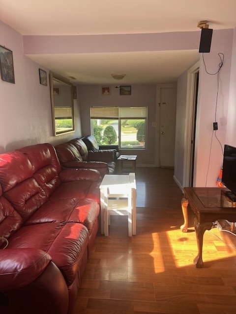 1917 Honore Avenue North Chicago, IL 60064 - Photo 2 of 27 a living room with furniture and a large window