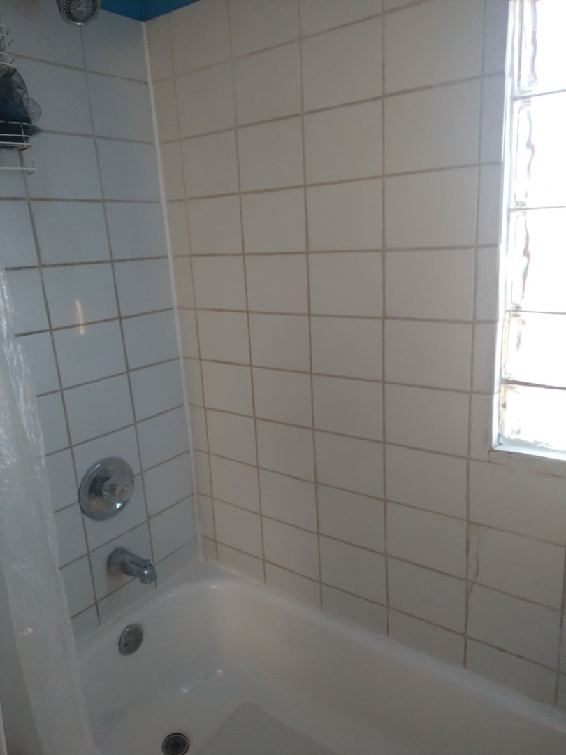 1917 Honore Avenue North Chicago, IL 60064 - Photo 26 of 27 a bathroom with a window