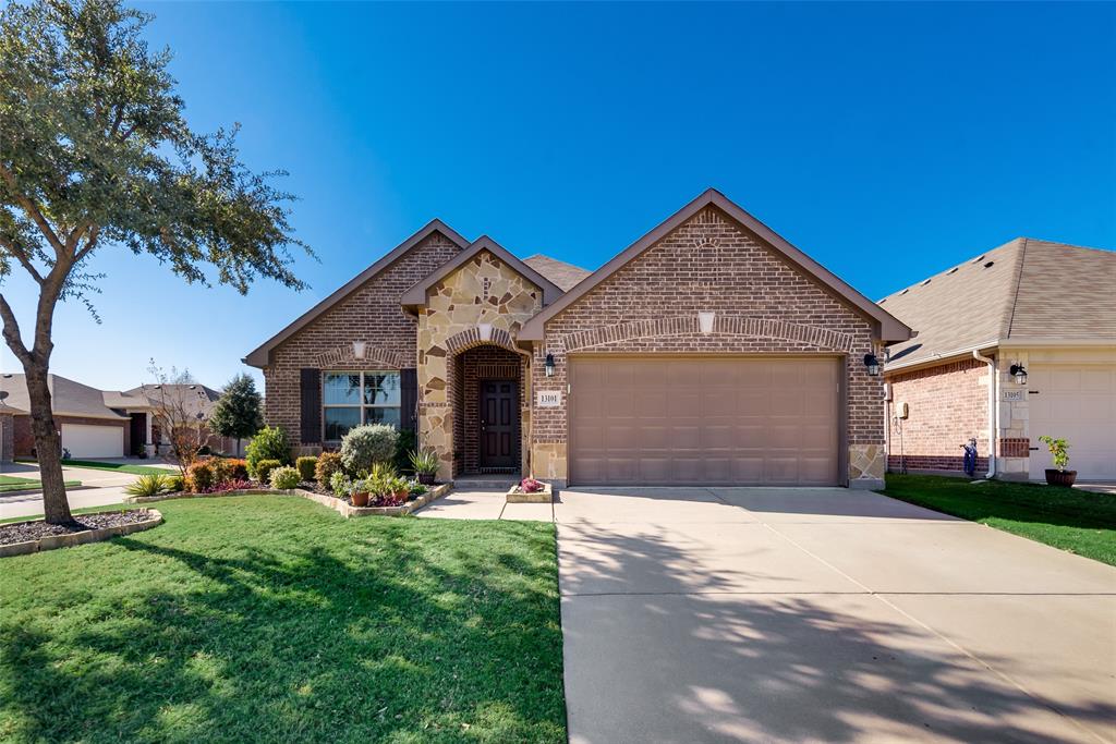 13101 Larks View Point Fort Worth, TX 76244 - Photo 1 of 1 a front view of a house with a yard and garage