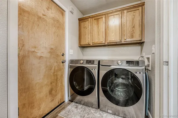 a utility room with dryer and washer