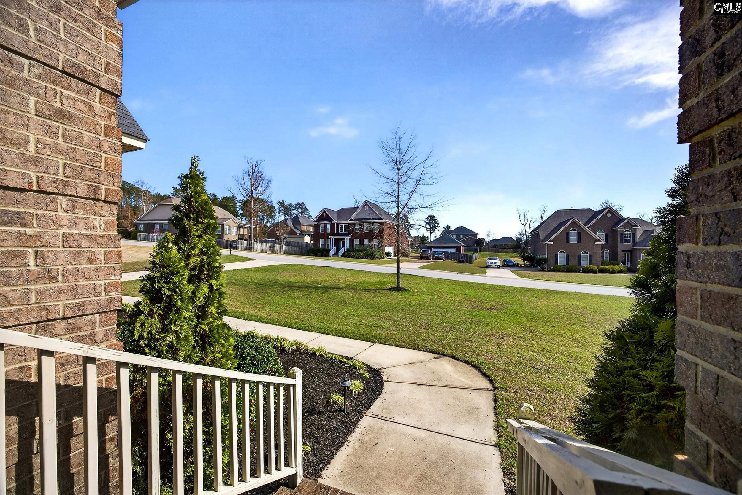 116 Renard Way Gilbert, SC 29054 - Photo 9 of 74 a view of a garden and basketball court