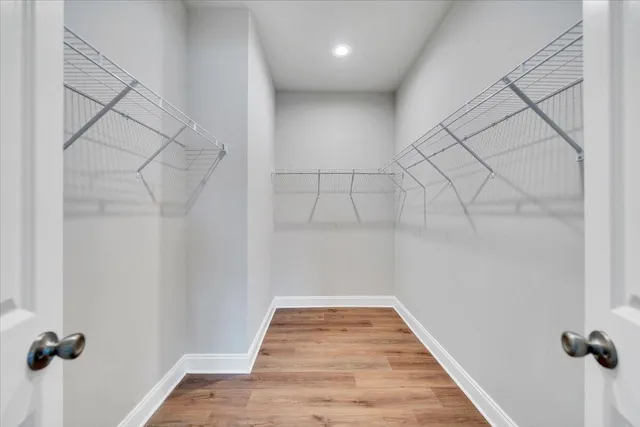 a view of a room with racks on the wall