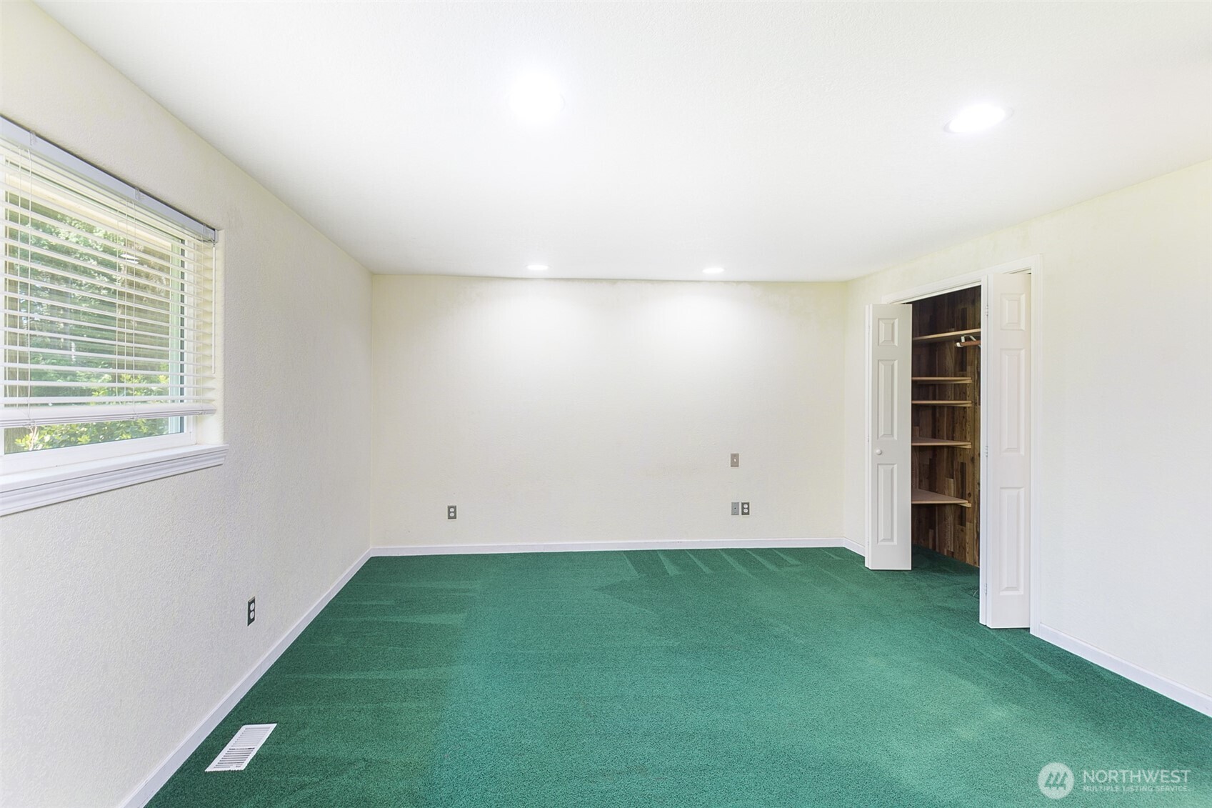 123 Forest Ridge Drive Sequim, WA 98382 - Photo 27 of 32 an empty room with closet