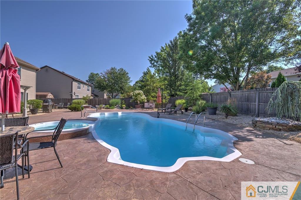 12 Higgins Road Old Bridge, NJ 08857 - Photo 21 of 25 a view of outdoor space yard swimming pool and patio