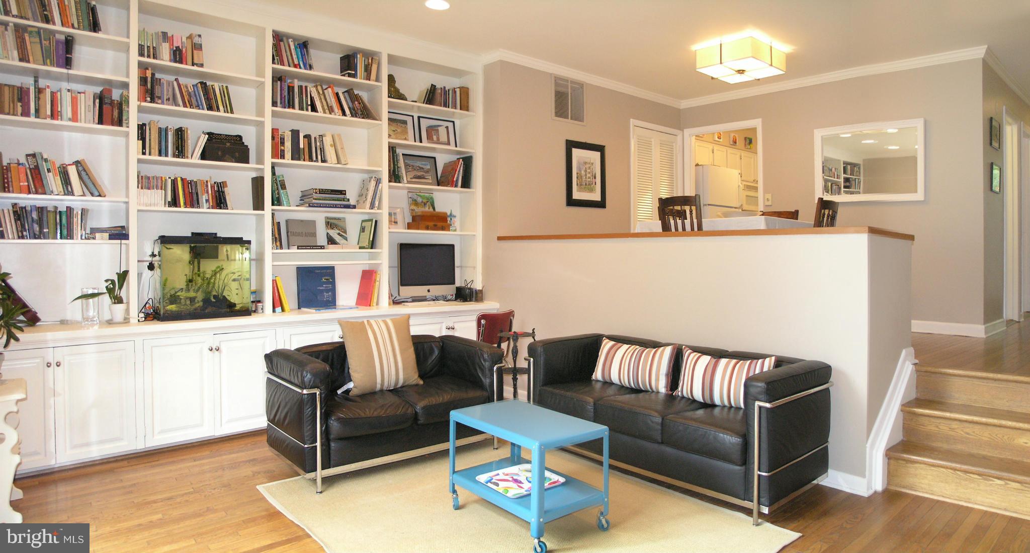 2013 Sarazen Place Reston, VA 20191 - Photo 9 of 27 Living Room has full wall bookcases
