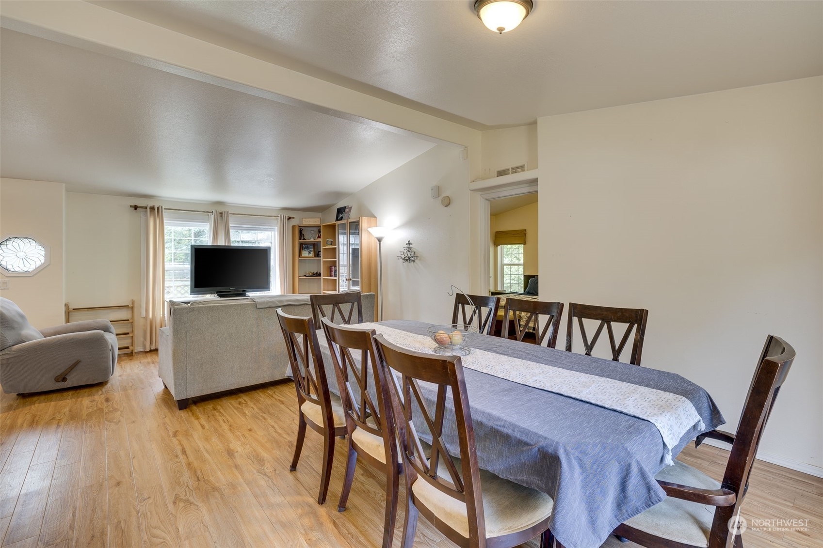 6724 Skinner Road Granite Falls, WA 98252 - Photo 9 of 28 a view of a dining room with furniture and wooden floor