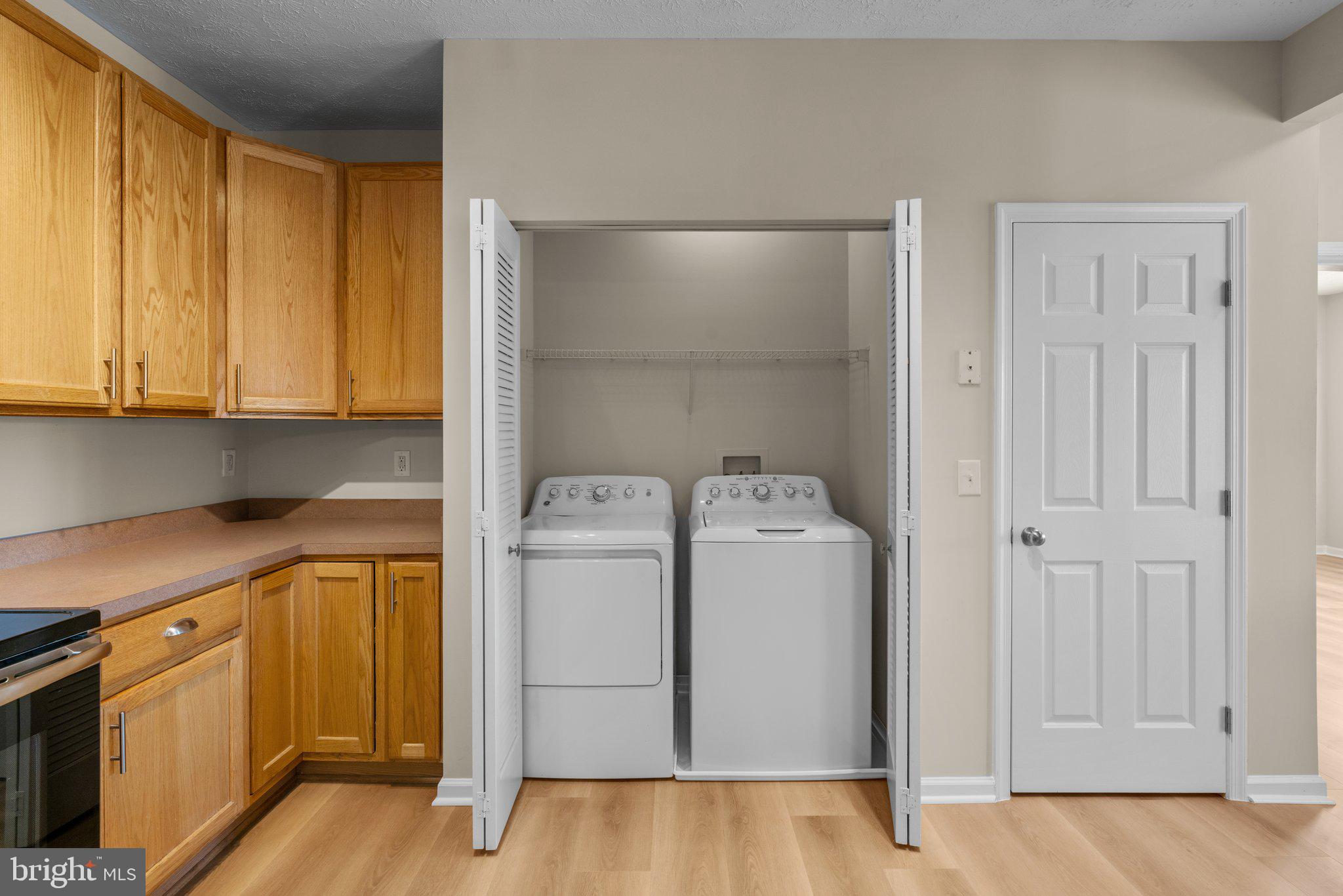 5458 Glenthorne Court, Unit 5458 Baltimore, MD 21237 - Photo 11 of 32 a utility room with dryer and washer