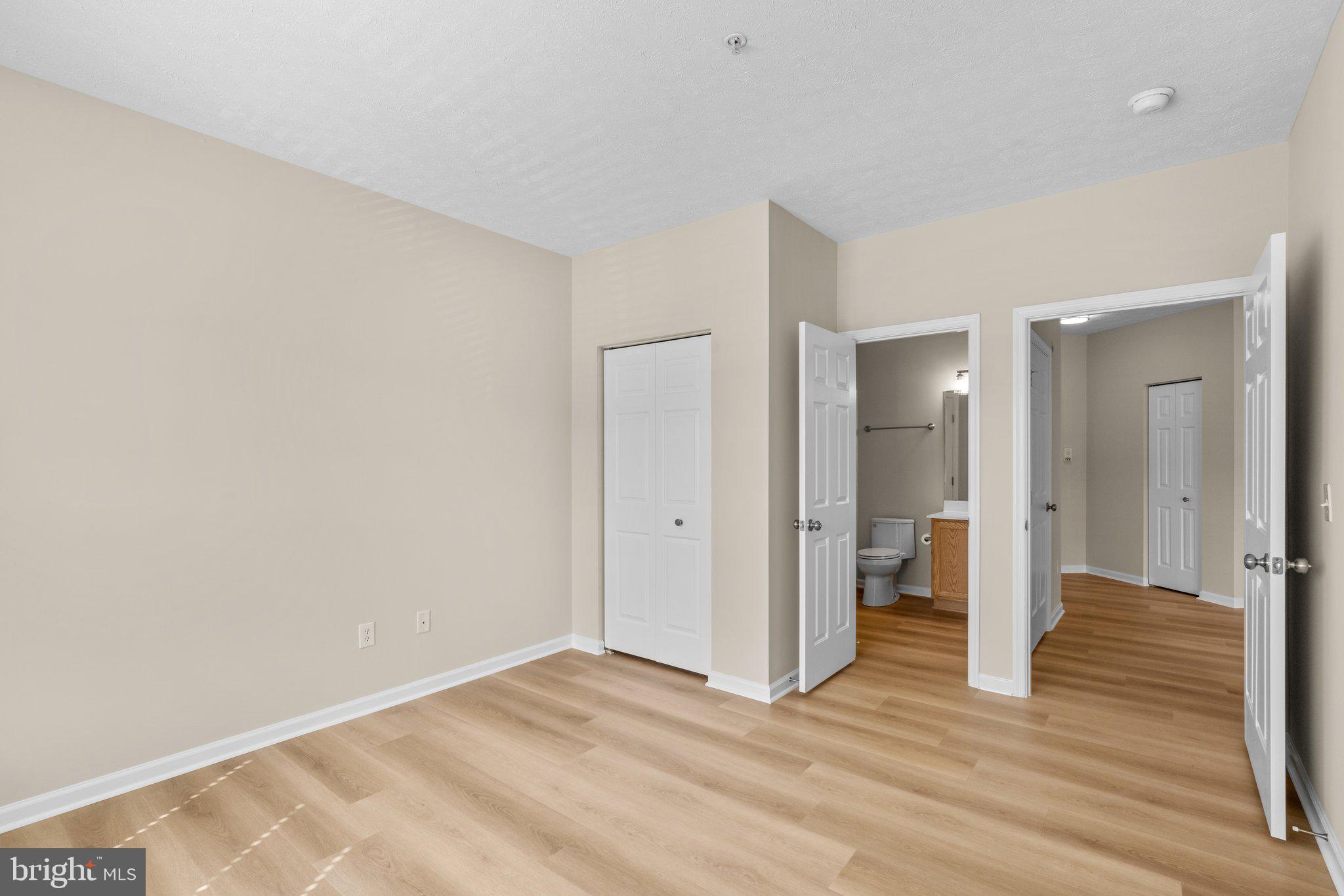 5458 Glenthorne Court, Unit 5458 Baltimore, MD 21237 - Photo 19 of 32 a view of a room with wooden floor and bathroom