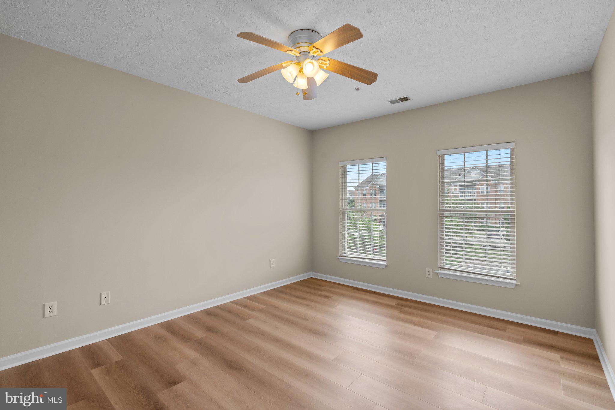 5458 Glenthorne Court, Unit 5458 Baltimore, MD 21237 - Photo 22 of 32 a view of an empty room with a window