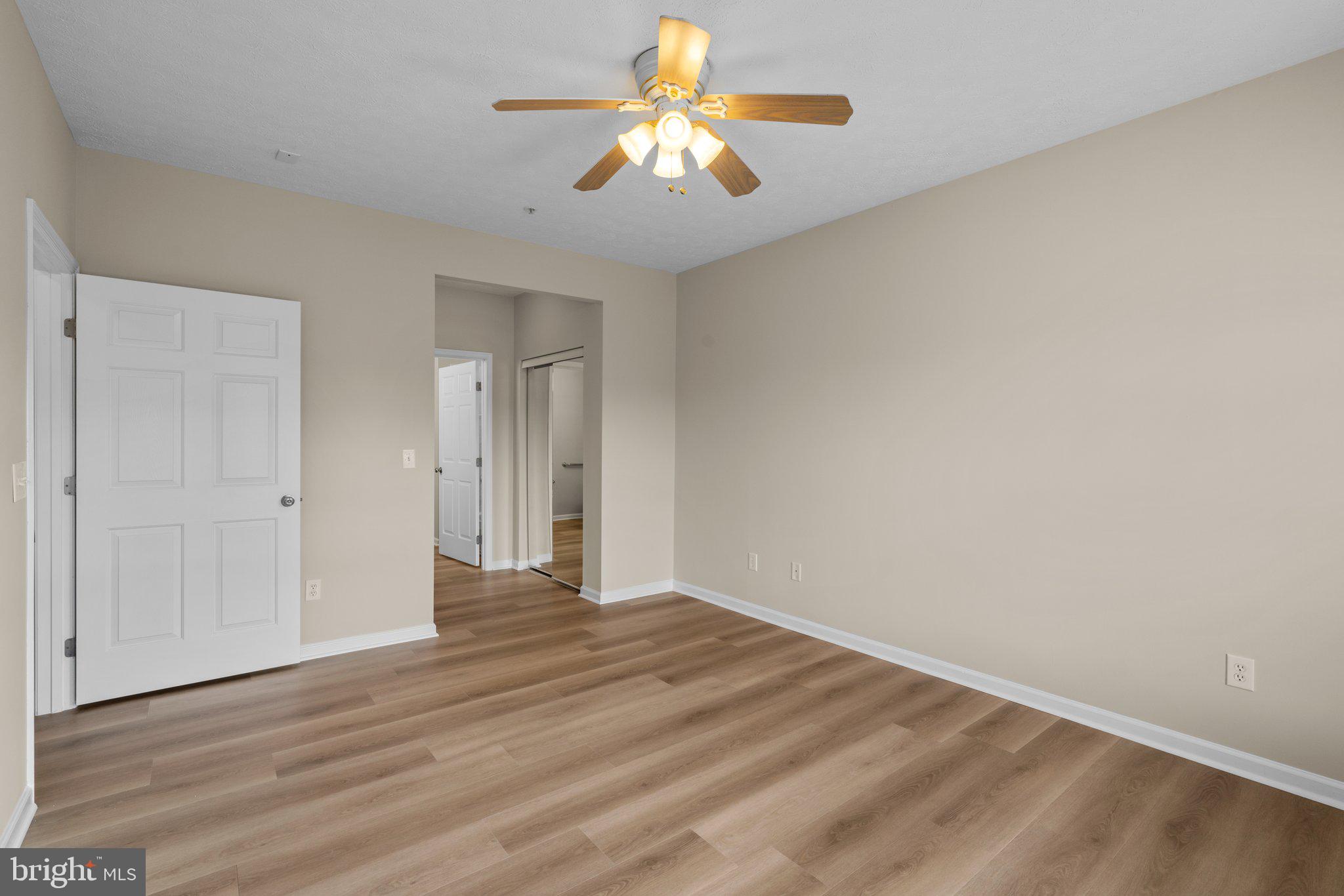 5458 Glenthorne Court, Unit 5458 Baltimore, MD 21237 - Photo 23 of 32 a view of empty room with wooden floor