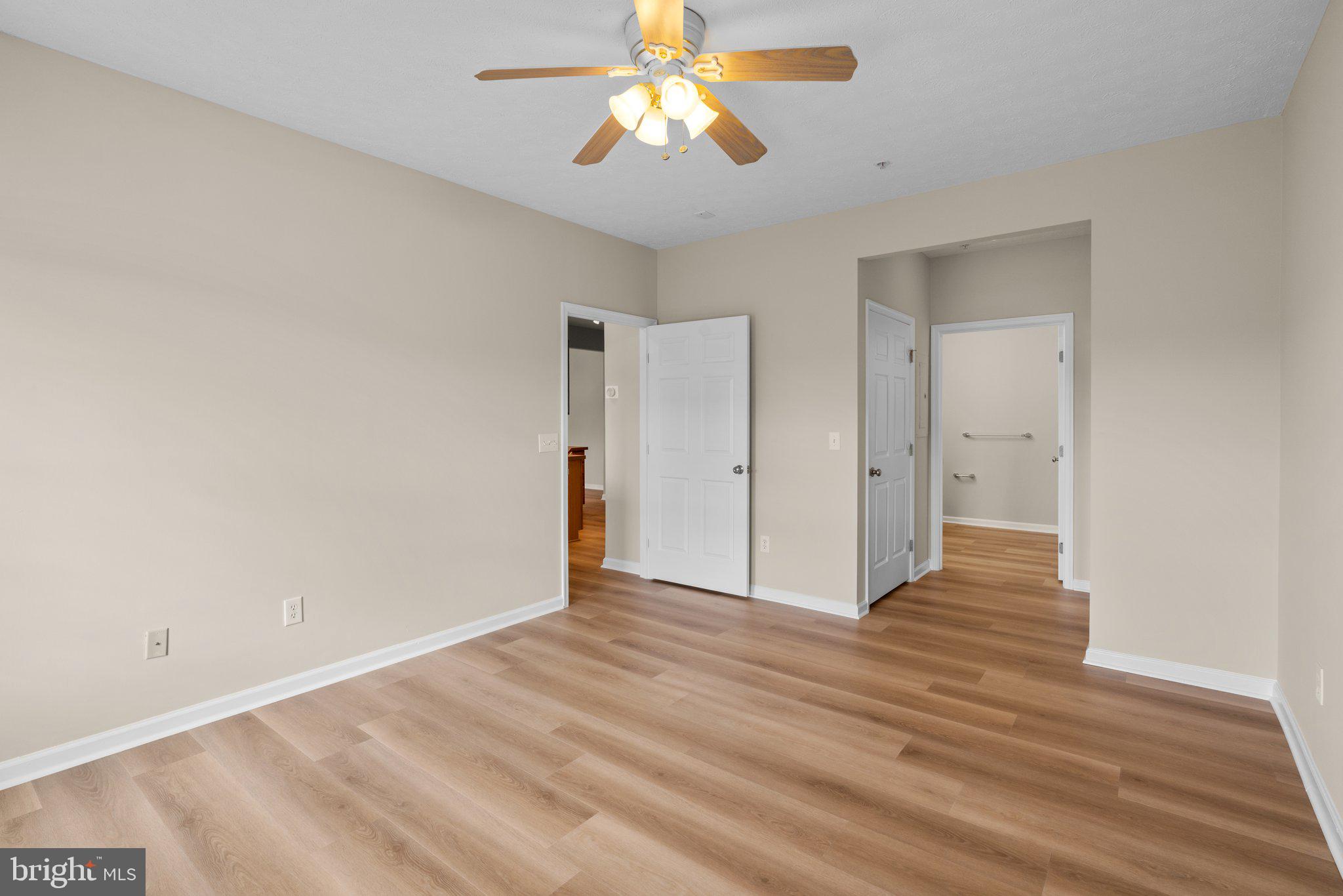 5458 Glenthorne Court, Unit 5458 Baltimore, MD 21237 - Photo 25 of 32 a view of empty room with wooden floor