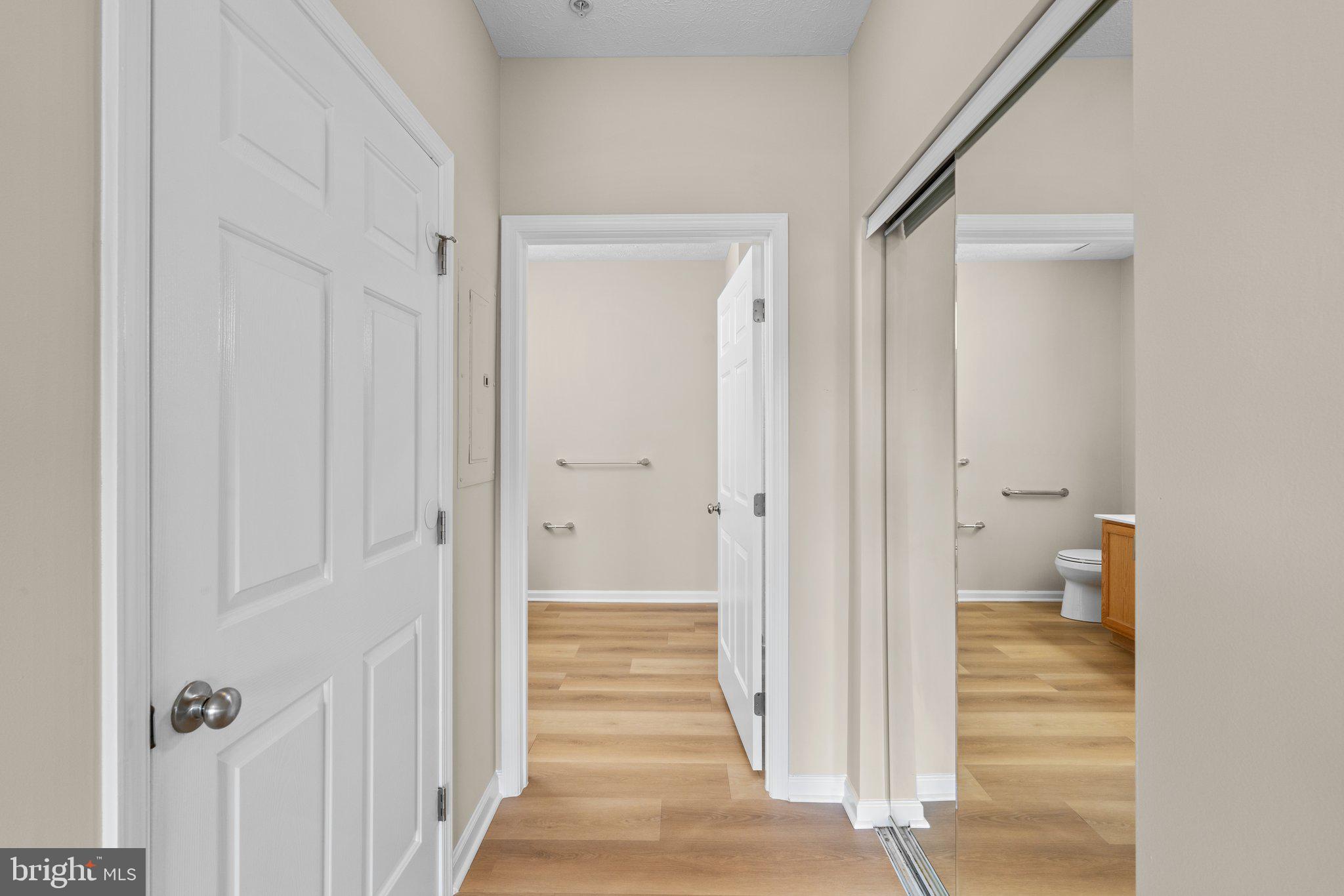 5458 Glenthorne Court, Unit 5458 Baltimore, MD 21237 - Photo 28 of 32 a view of a bathroom from a hallway