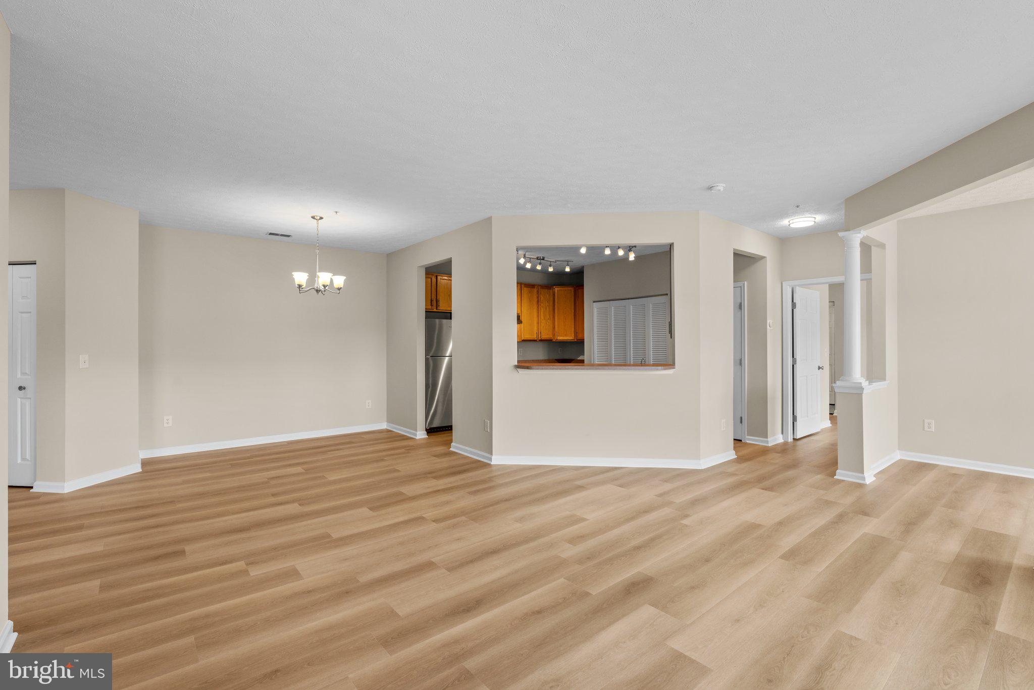 5458 Glenthorne Court, Unit 5458 Baltimore, MD 21237 - Photo 3 of 32 a view of empty room with wooden floor
