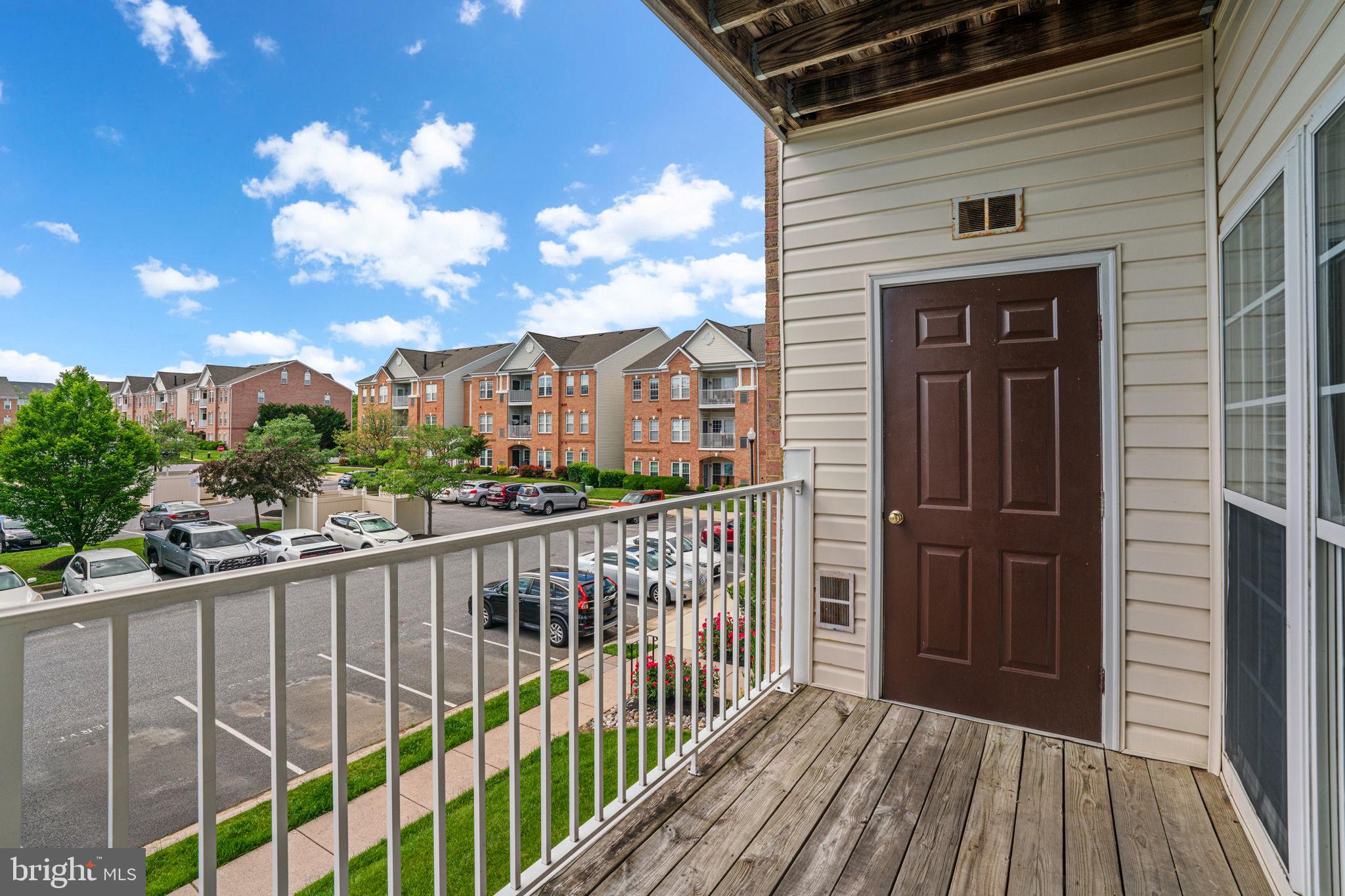 5458 Glenthorne Court, Unit 5458 Baltimore, MD 21237 - Photo 31 of 32 a view of a houses from a balcony