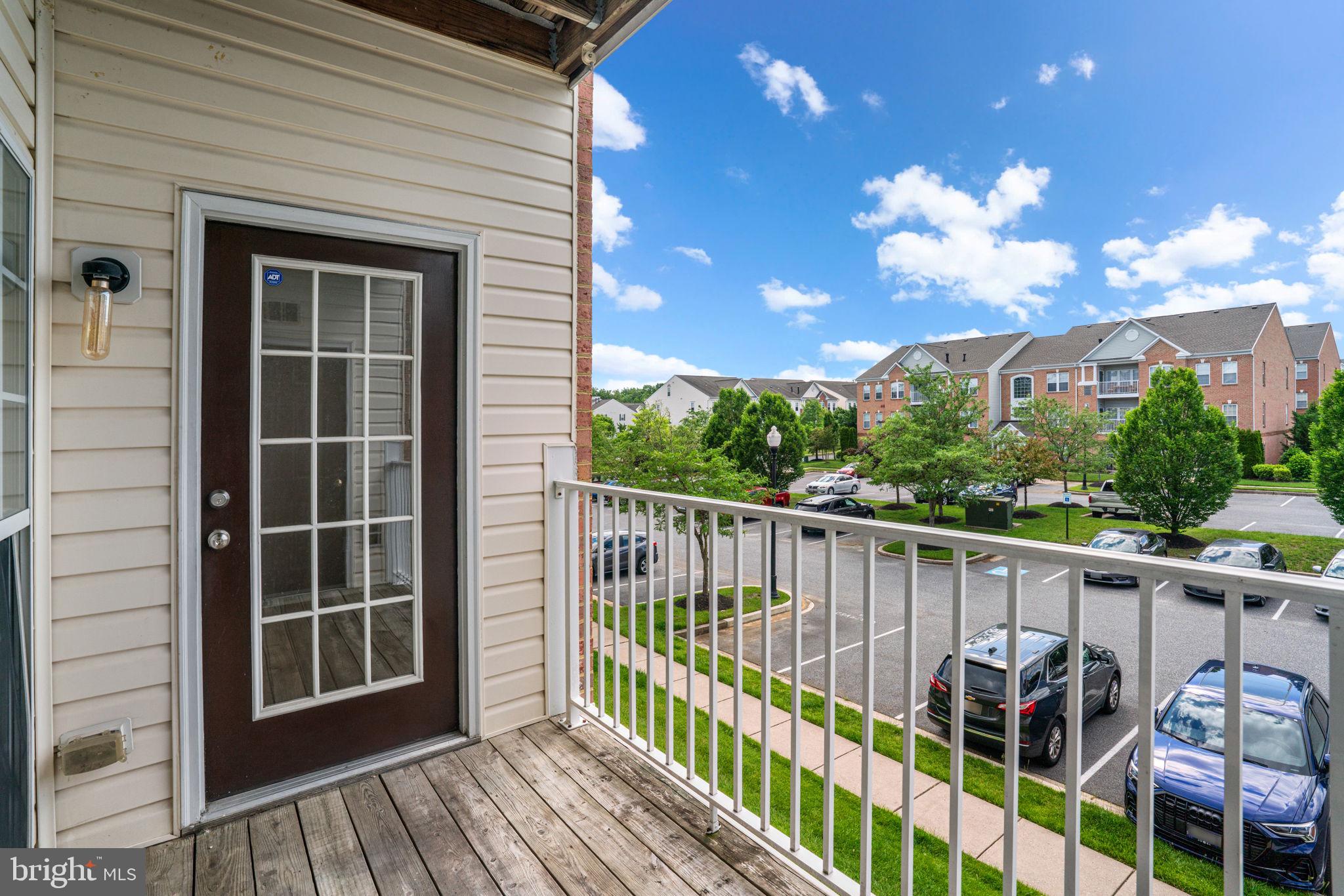 5458 Glenthorne Court, Unit 5458 Baltimore, MD 21237 - Photo 32 of 32 a view of a balcony with an outdoor space