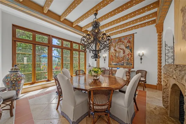 a living room with furniture a window and a table