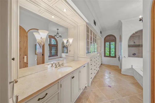 a living room with furniture fireplace and wooden floor