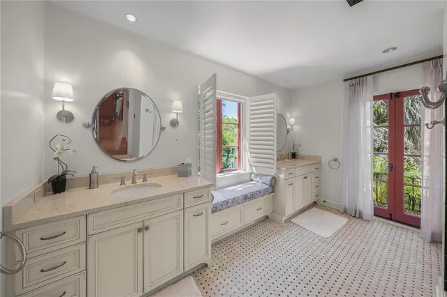 a view of a lake with a palm tree