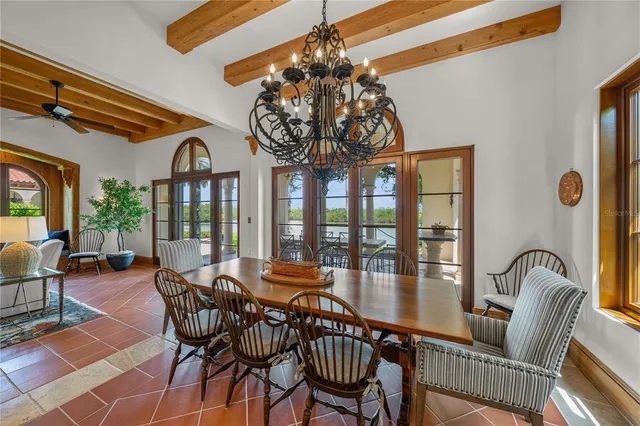 a kitchen with stainless steel appliances kitchen island granite countertop a sink and cabinets