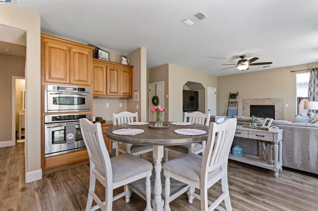 a bathroom with a sink toilet and mirror