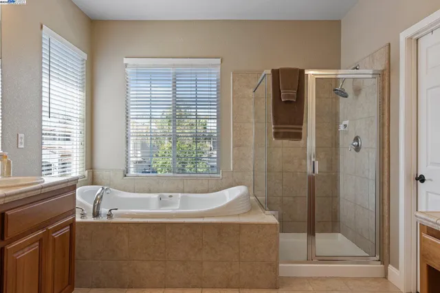 a view of yard with patio