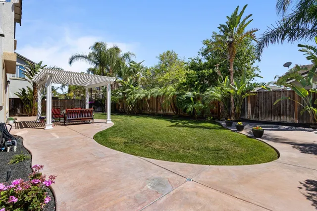 an aerial view of a house with a lake view