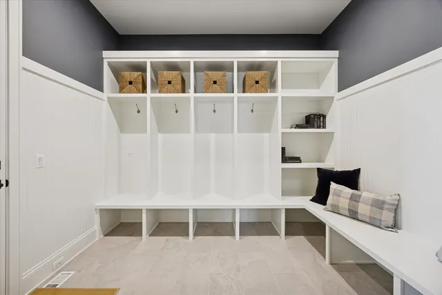 a view of staircase with wooden floor and windows