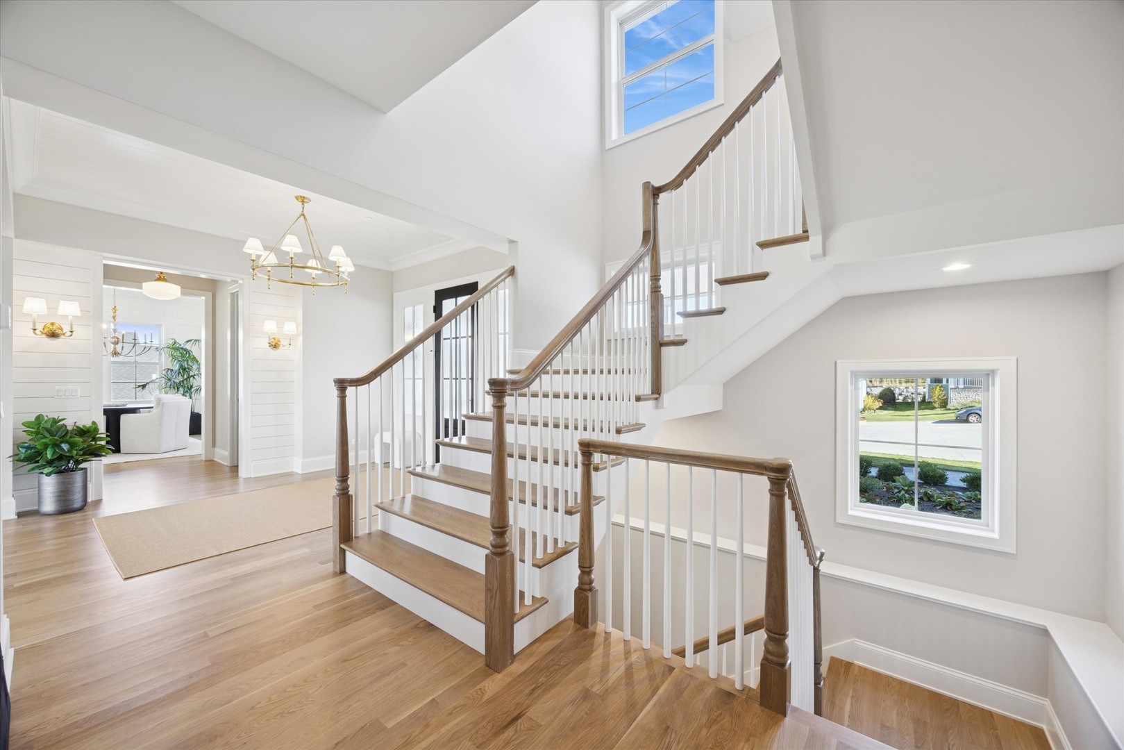 5904 Juniper Court Western Springs, IL 60558 - Photo 18 of 20 a view of staircase with wooden floor and windows