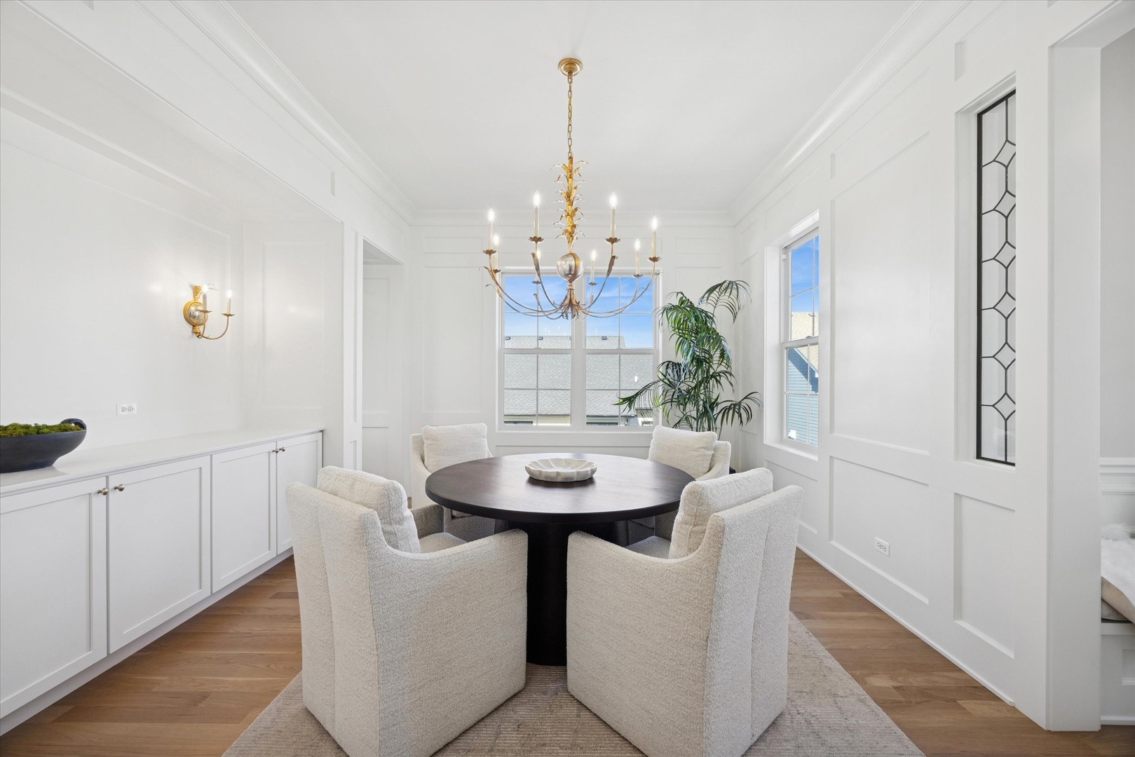 5904 Juniper Court Western Springs, IL 60558 - Photo 7 of 20 a dining room with chandelier and wooden floor