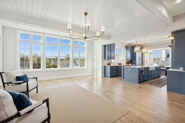 a large room with a large window and table