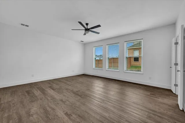 a backyard of a house with lots of green space